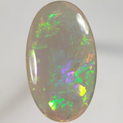 SOLID SEMI BLACK OPAL  Huge opal. Very bright fire, Large rolling flashes. SEE VIDEO